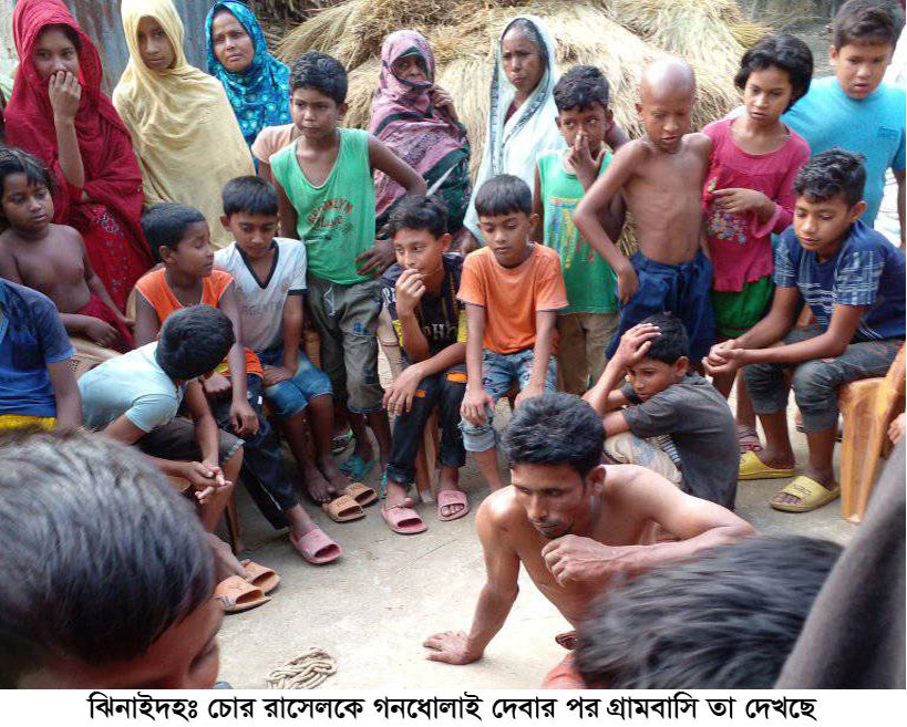 চুরি করতে গিয়ে ধরা পড়ে গণধোলাই খেলো চোর